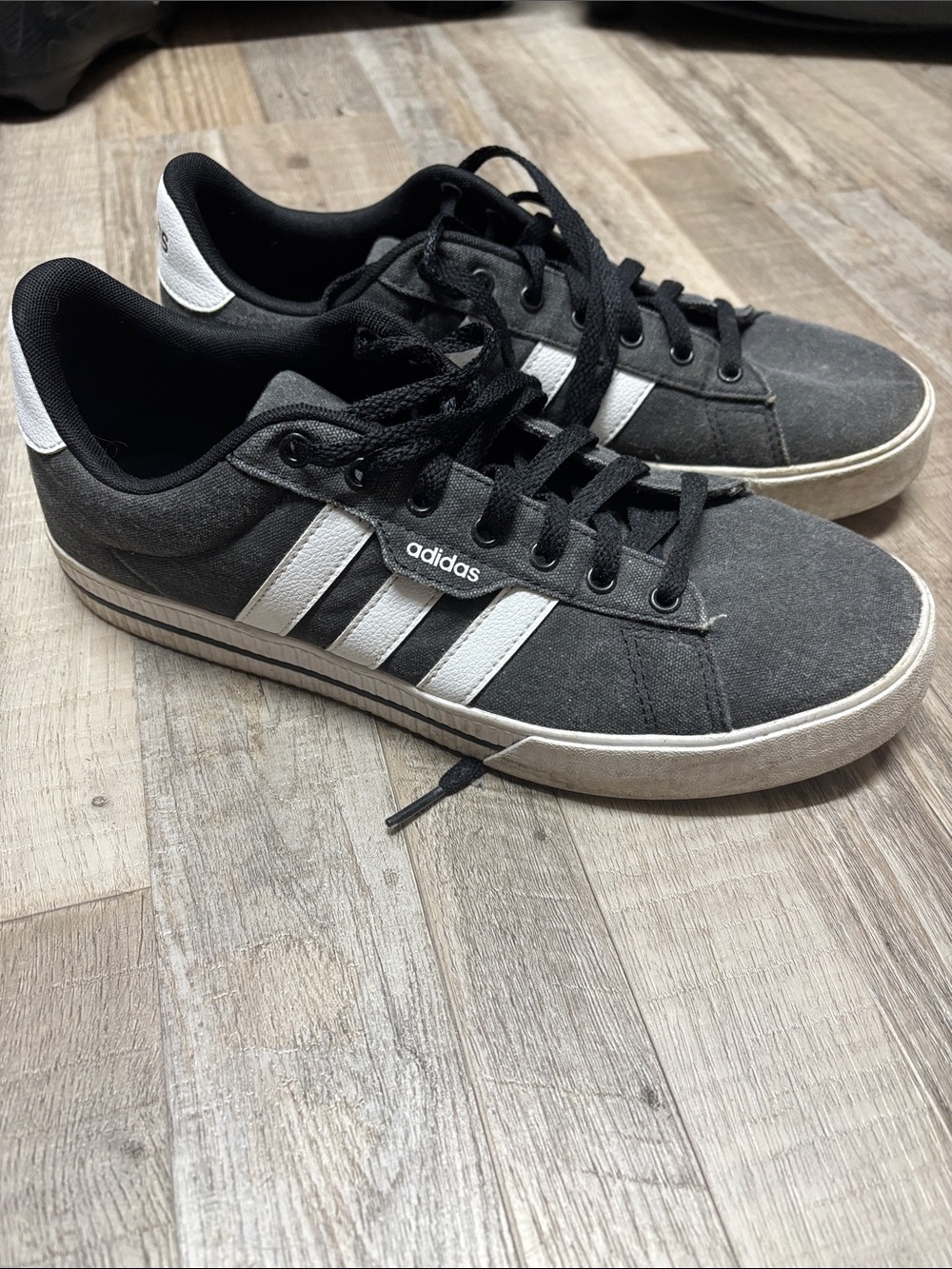 adidas Men’s Black Sneakers with White Stripes